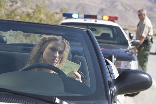 woman with driving ticket